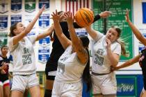 Green Valley High's Amelia Rawhouser (30) Kyra Willey (25) Saedy Cozo (44) and Liberty High's A ...