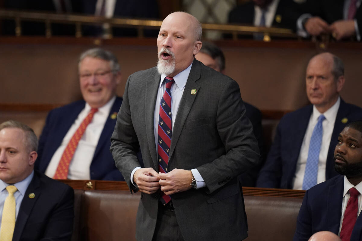 Rep. Chip Roy, R-Texas, votes for Rep. Kevin McCarthy, R-Calif., during the twelfth round of vo ...