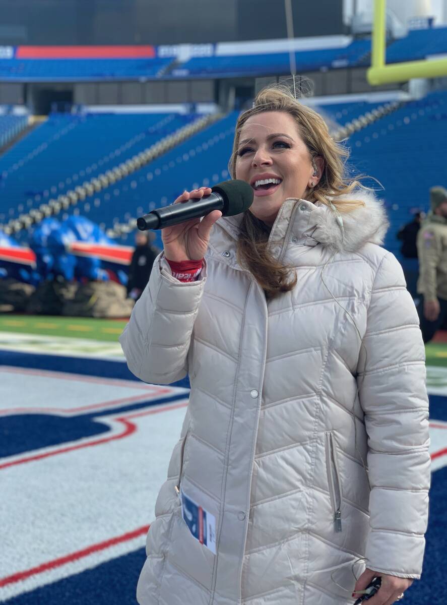 Las Vegas entertainer Janae Longo is shown rehearsing the national anthem at then-New Era Field ...