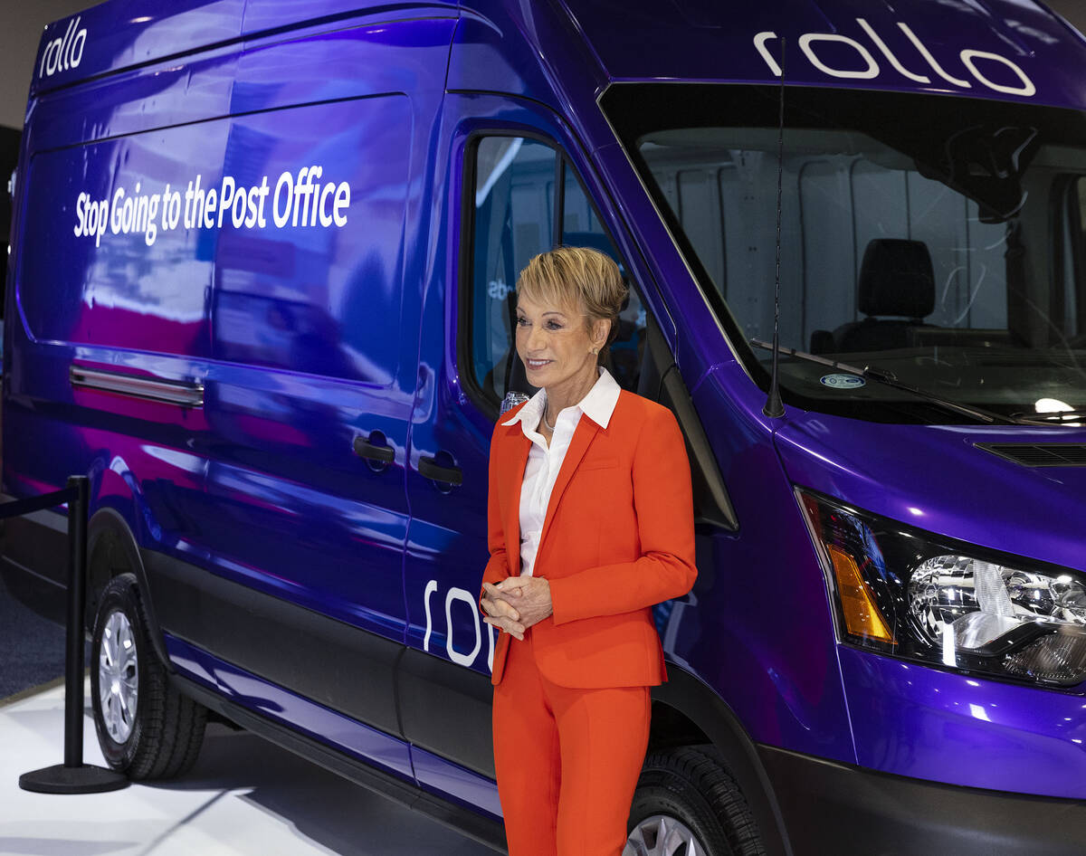 Shark Tank judge Barbara Corcoran poses for a photo at Las Vegas-based Rollo's booth during CES ...