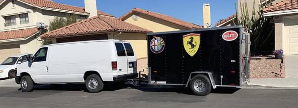This Ford van and cargo trailer was parked outside a Las Vegas home just after midnight on New ...