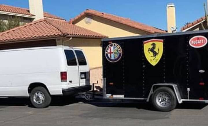 This Ford van and cargo trailer was parked outside a Las Vegas home just after midnight on New ...