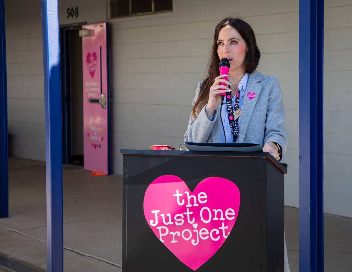 Brooke Neubauer, left, founder and CEO of The Just One Project, speaks during a ribbon-cutting ...