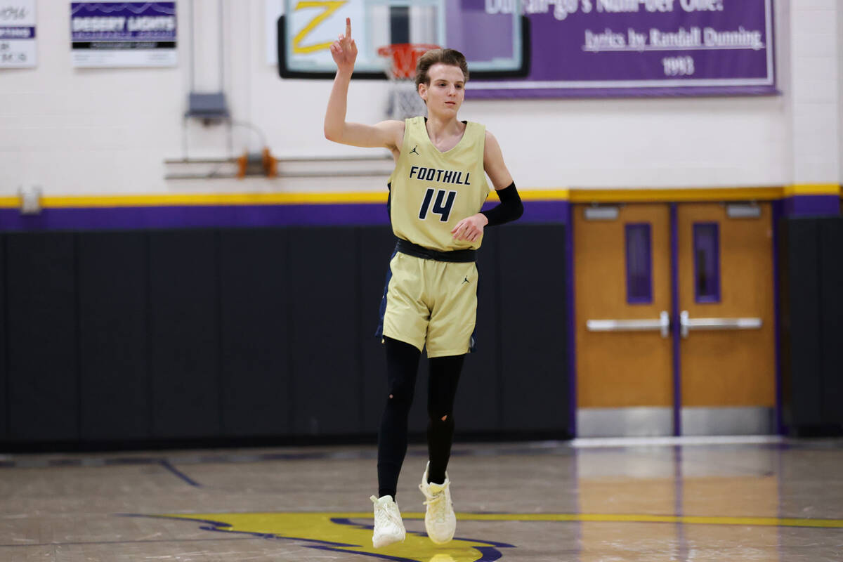 Foothill's Christopher Natale Jr. (14) reacts after scoring a 3-point-shot against Durango duri ...