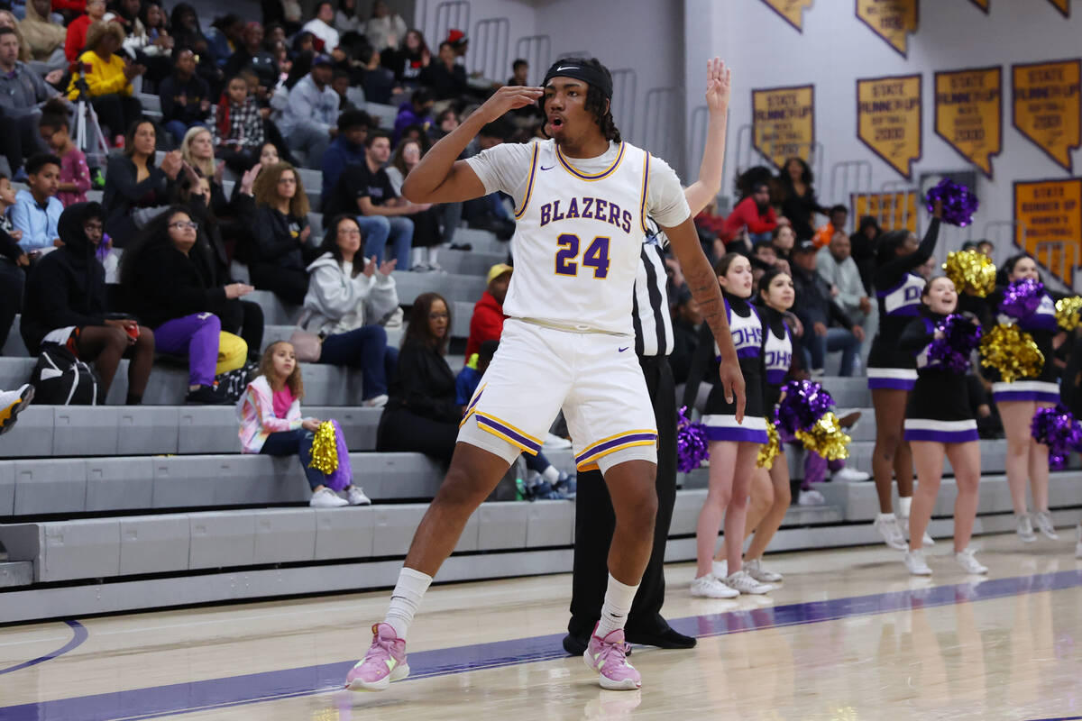 Durango's Taj Degourville (24) reacts after scoring a 3-point-shot against Foothill during a bo ...