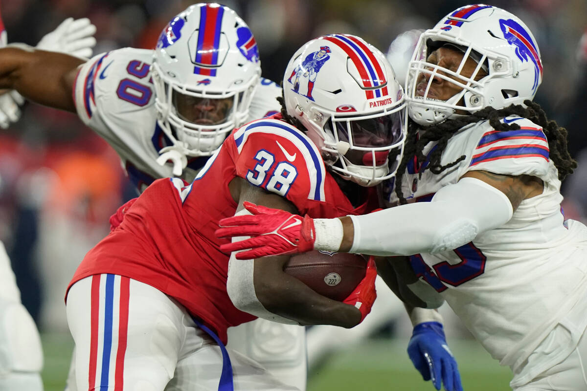 New England Patriots running back Rhamondre Stevenson (38) during the first half of an NFL foot ...