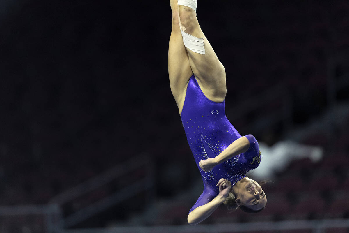 Kennedi Davis, University of Washington, performs her floor routine during session one of the S ...