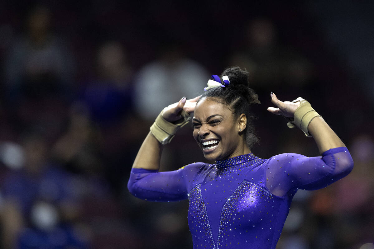 University of Washington’s Amara Cunningham performs her floor routine during session on ...