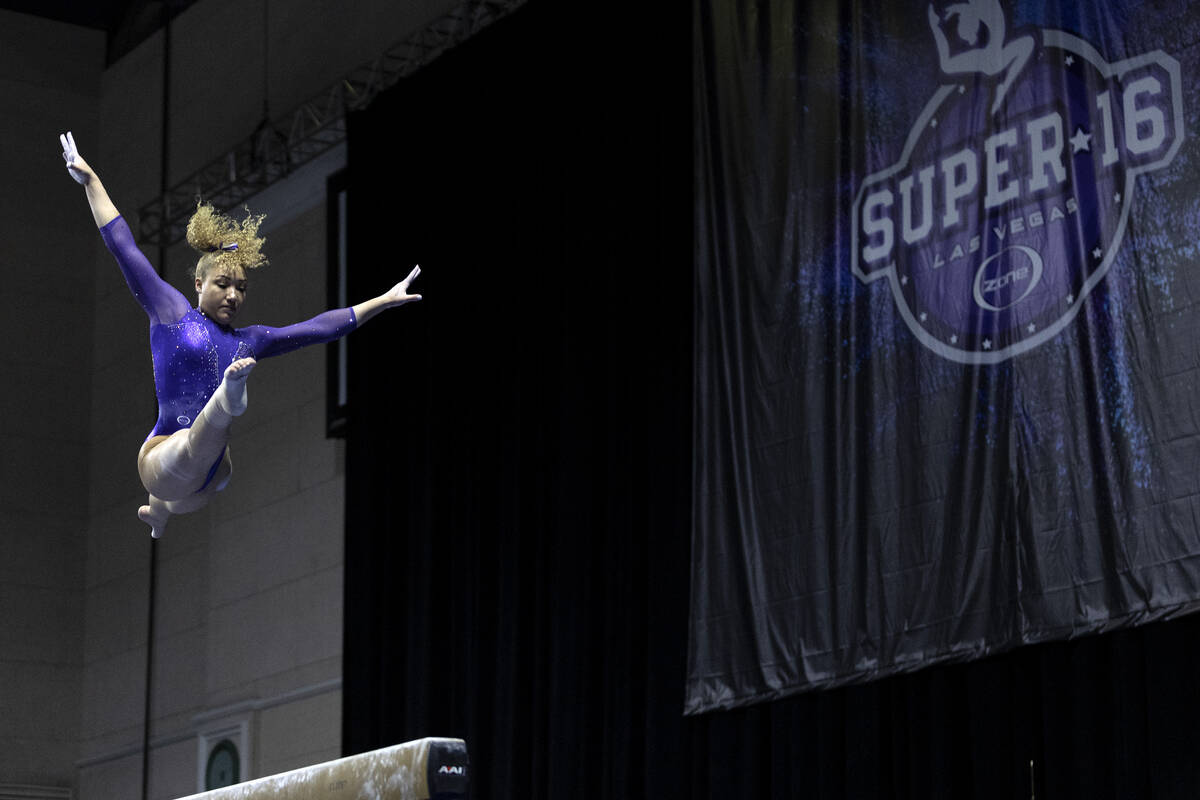 University of Washington’s Brenna Brooks performs on balance beam during session one of ...