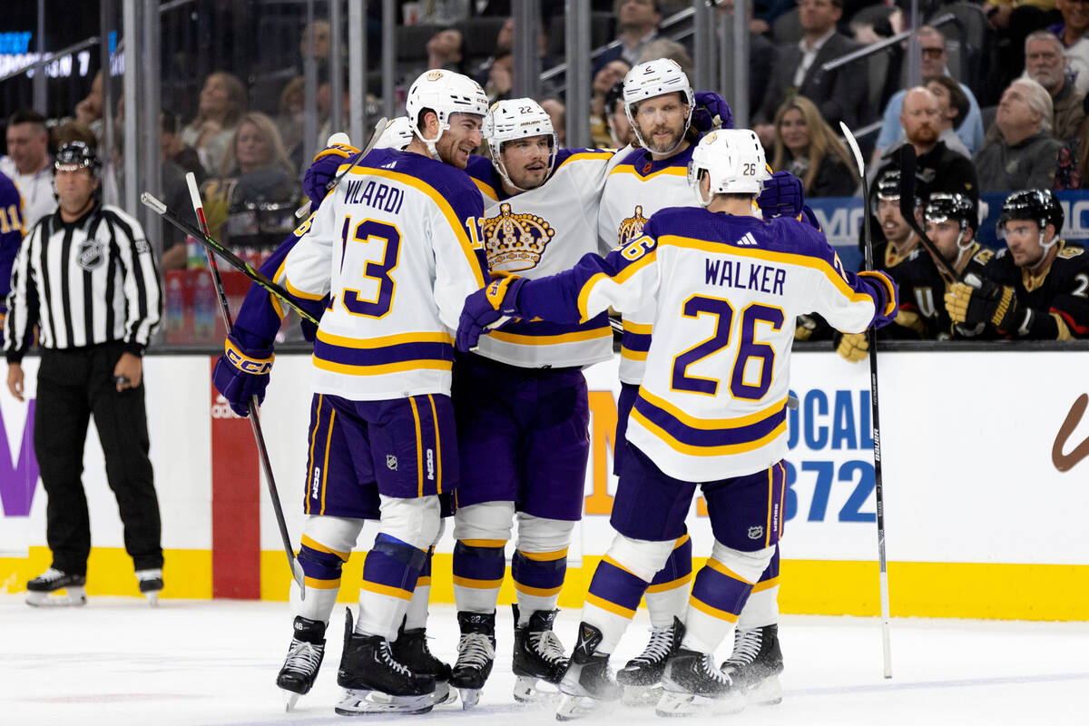 The Los Angeles Kings celebrate after left wing Kevin Fiala, center left, scored a goal against ...
