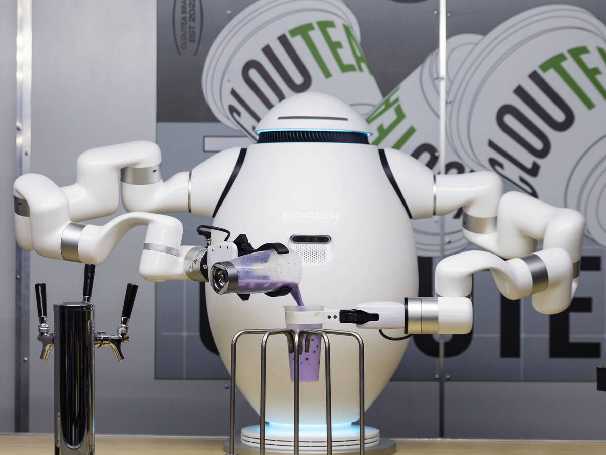 A robot from Richtech Robotics makes boba tea during CES 2023 at the Las Vegas Convention Cente ...