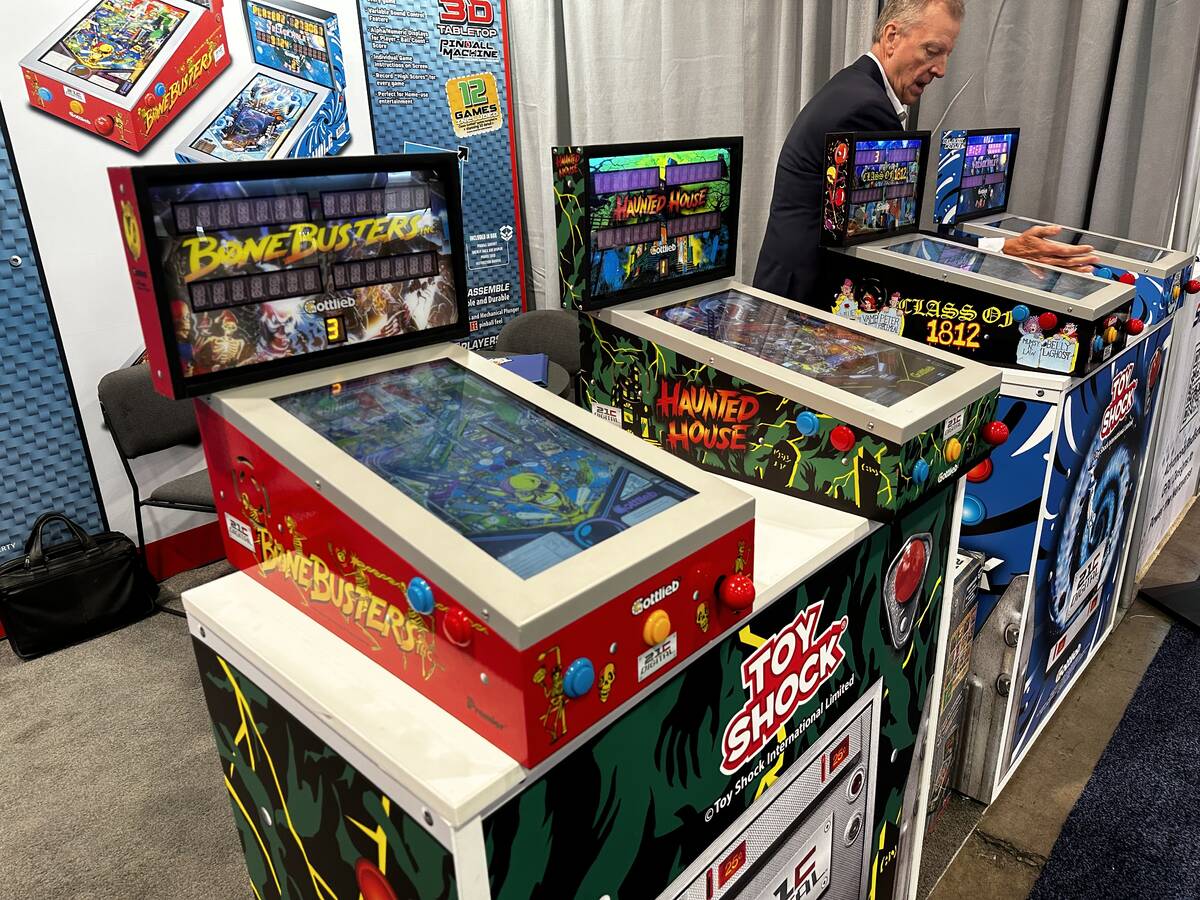 Toy Shock International displays versions of its digital pinball machine, which features the ga ...