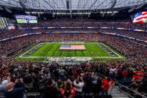 The National Anthem its played by guitarist Joe Satriani before the first half of their NFL gam ...