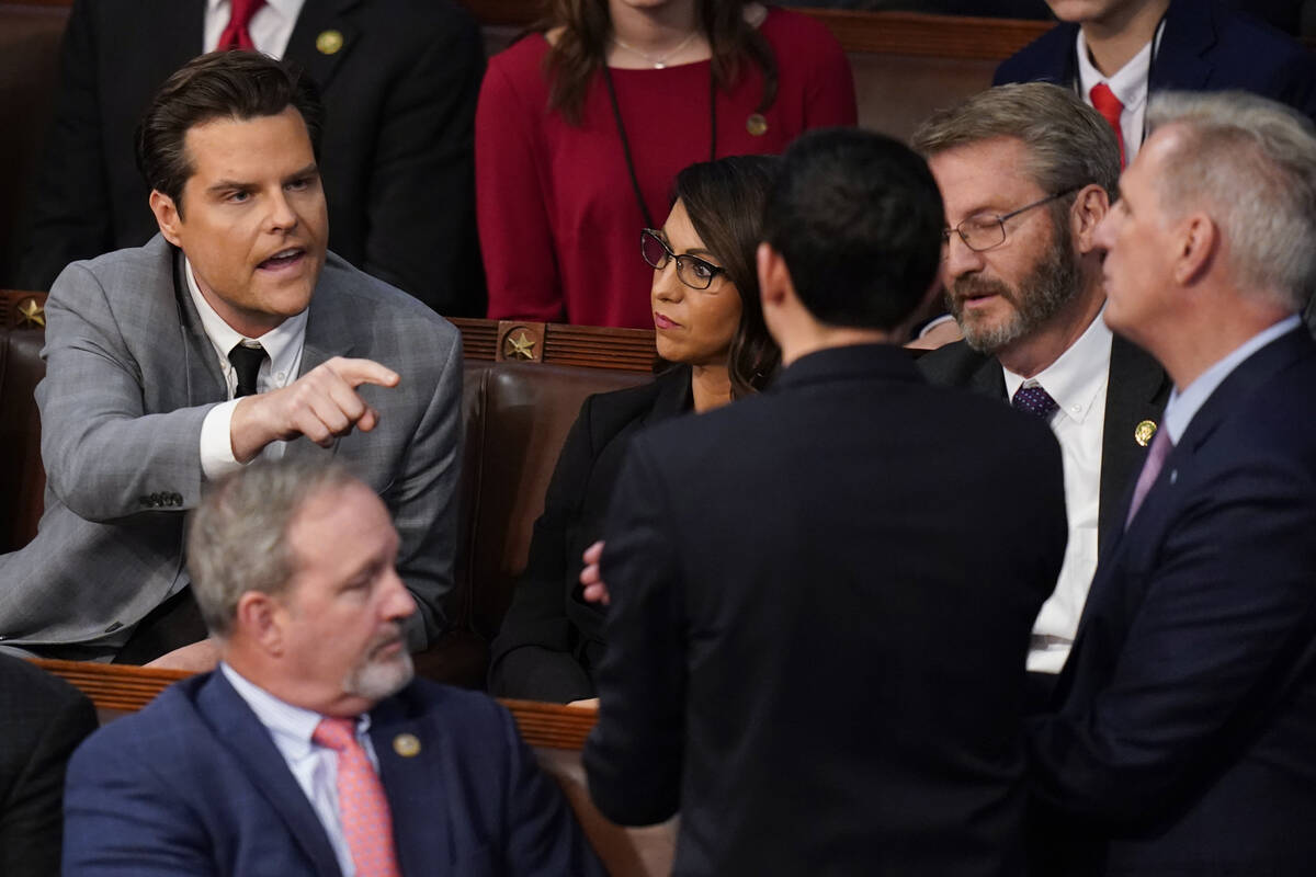 Rep. Matt Gaetz, R-Fla., talks to Rep. Kevin McCarthy, R-Calif., after Gaetz voted "presen ...
