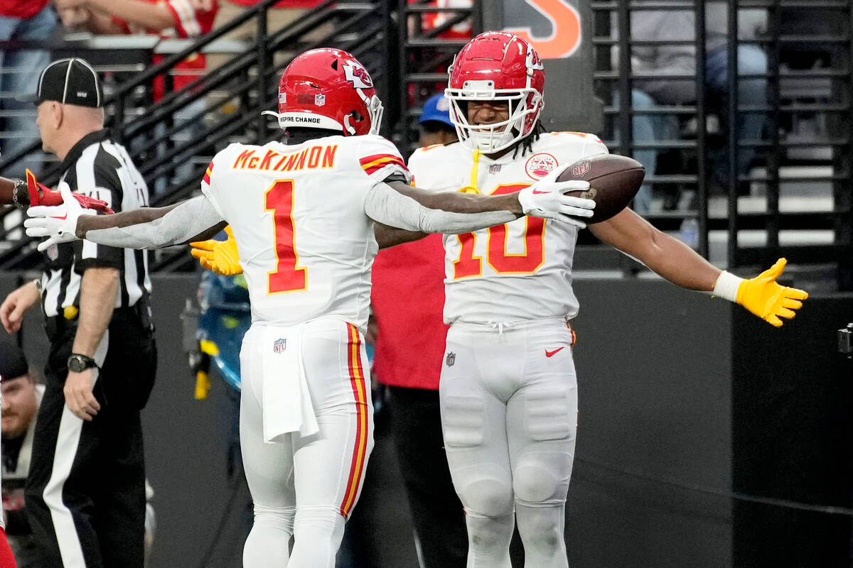 Kansas City Chiefs running back Jerick McKinnon (1) is congratulated by Isiah Pacheco (10) afte ...