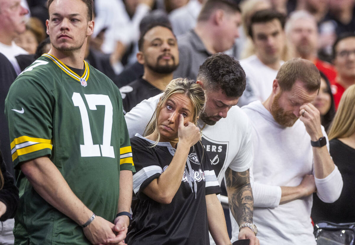Fans become emotions as they show their support for injured player Damar Hamlin as the Raiders ...