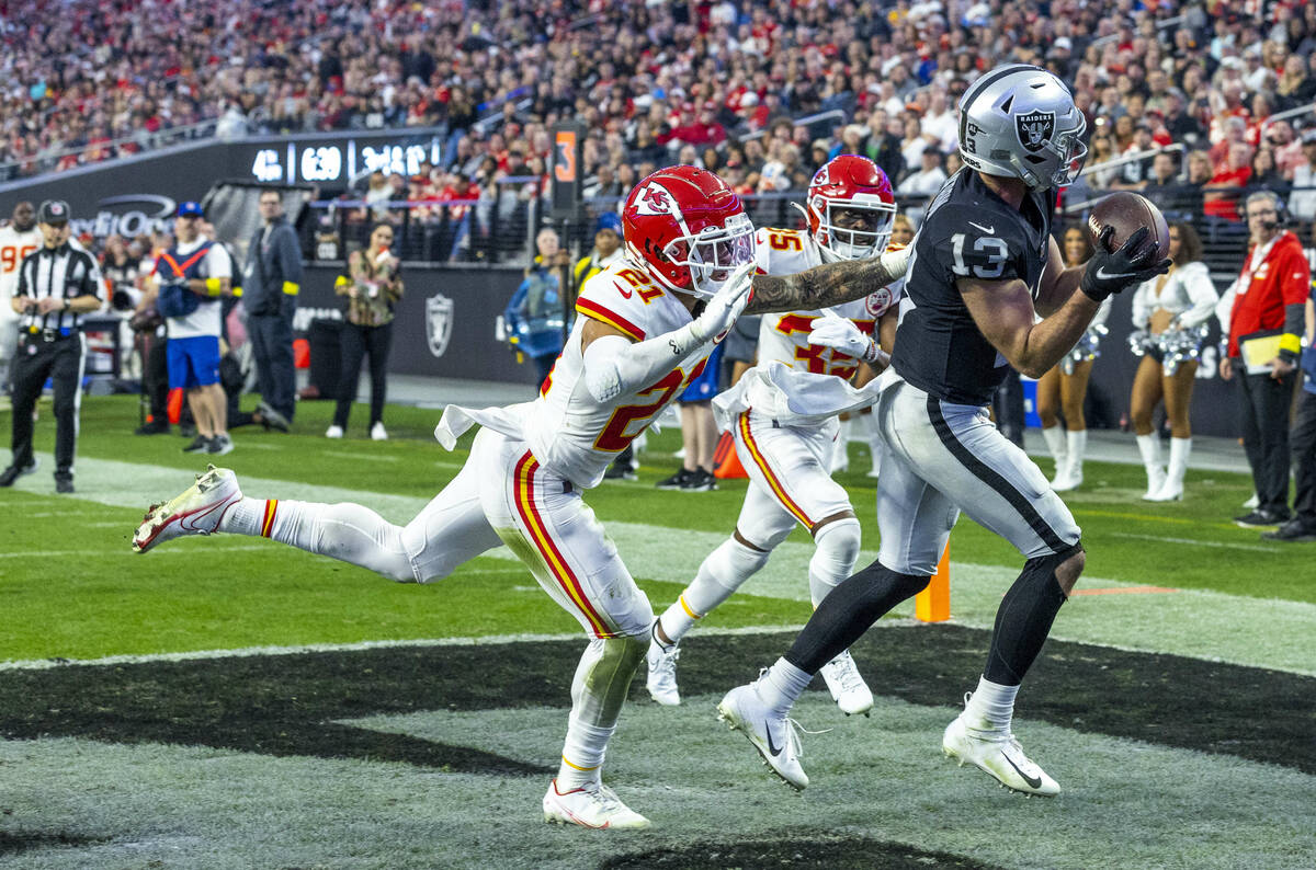 Raiders wide receiver Hunter Renfrow (13) makes a touchdown grab in the end zone over Kansas Ci ...
