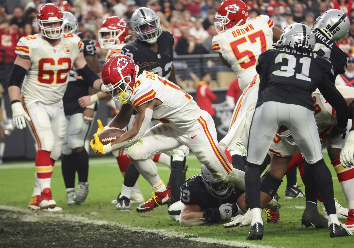 Kansas City Chiefs running back Isiah Pacheco (10) scores a touchdown against the Raiders durin ...