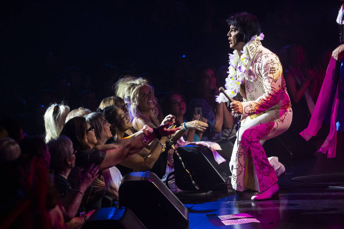 FILE - Elvis tribute artist Ben Portsmouth, of England, performs during the The King of Las Veg ...