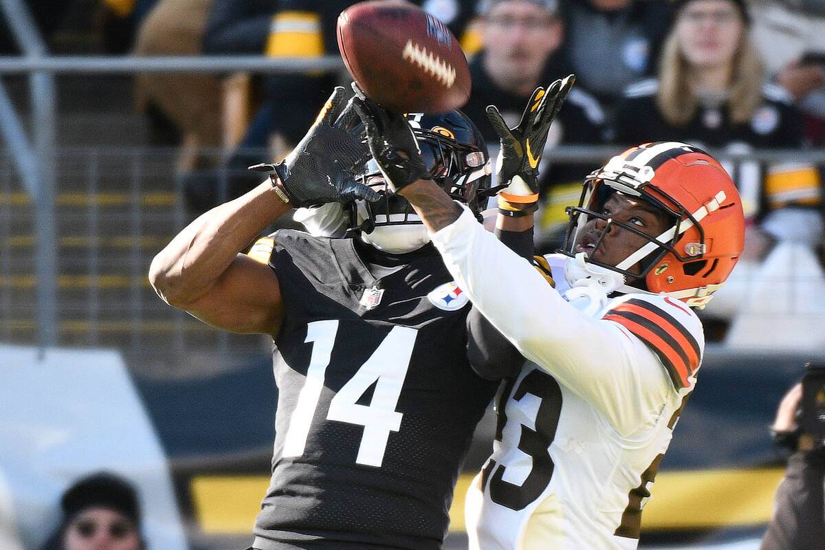 Cleveland Browns cornerback Martin Emerson Jr. (23) breaks up a pass intended for Pittsburgh St ...