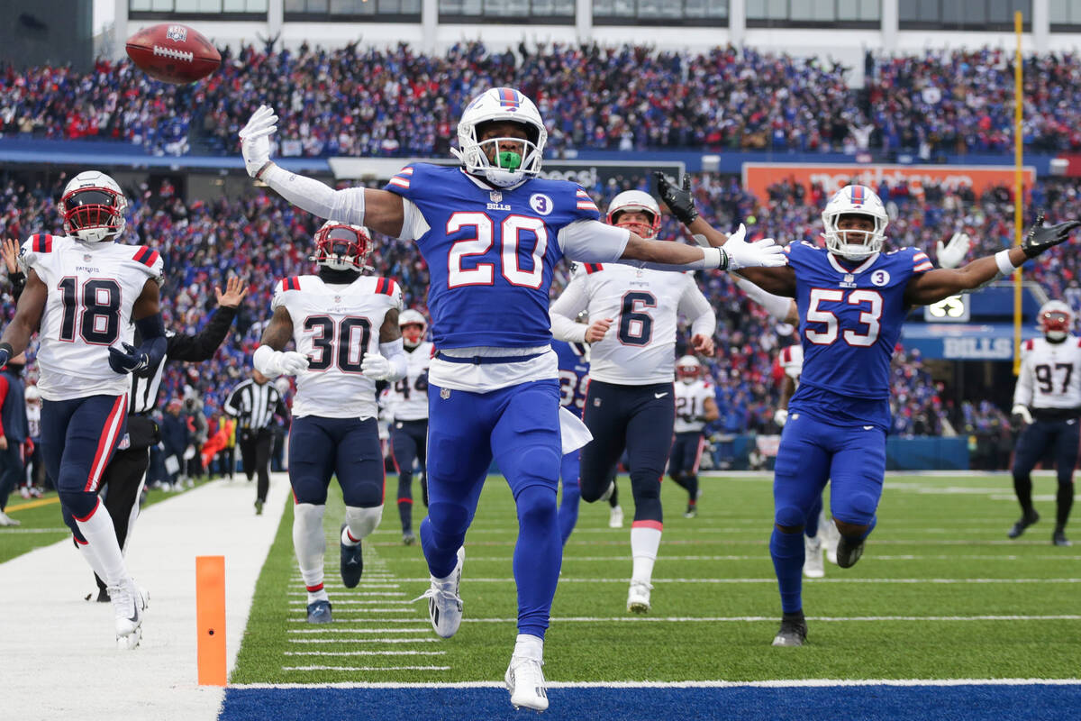 Buffalo Bills running back Nyheim Hines (20) scores a touchdown on a kickoff return during the ...