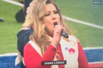 A screen grab of Las Vegas singer Janae Longo singing the national anthem at Highmark Stadium i ...