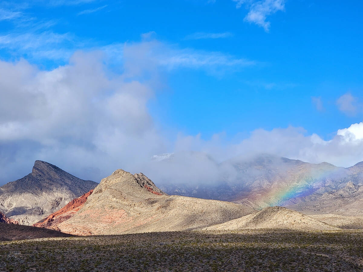 A partial rainbow as seen on Jan. 1, 2023, from the Red Rock sign, a popular photo stop along s ...