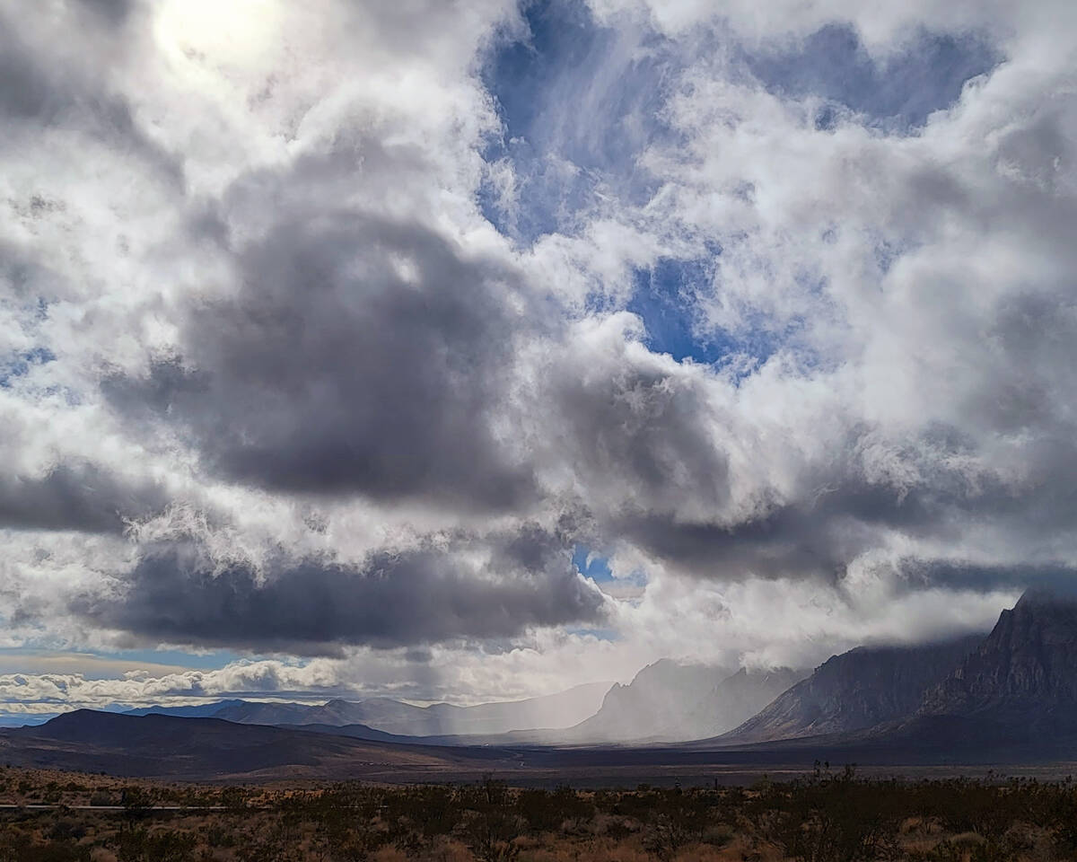Dramatic clouds and lighting as seen looking south from Red Rock’s Sandstone Quarry on J ...