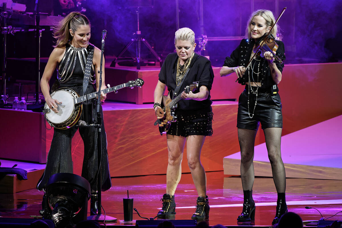 Emily Strayer, from left, Natalie Maines, and Martie Maguire, of The Chicks, perform on Wednesd ...