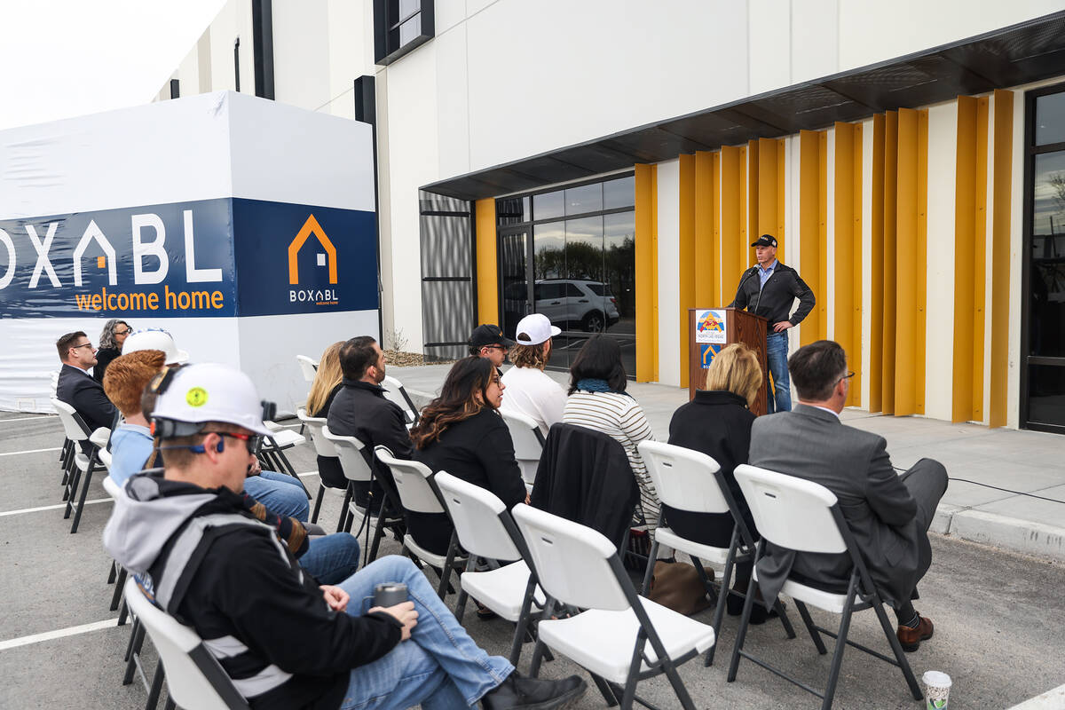 Christian Kirchen, director of manufacturing for Boxabl, addresses the crowd at a ribbon cuttin ...