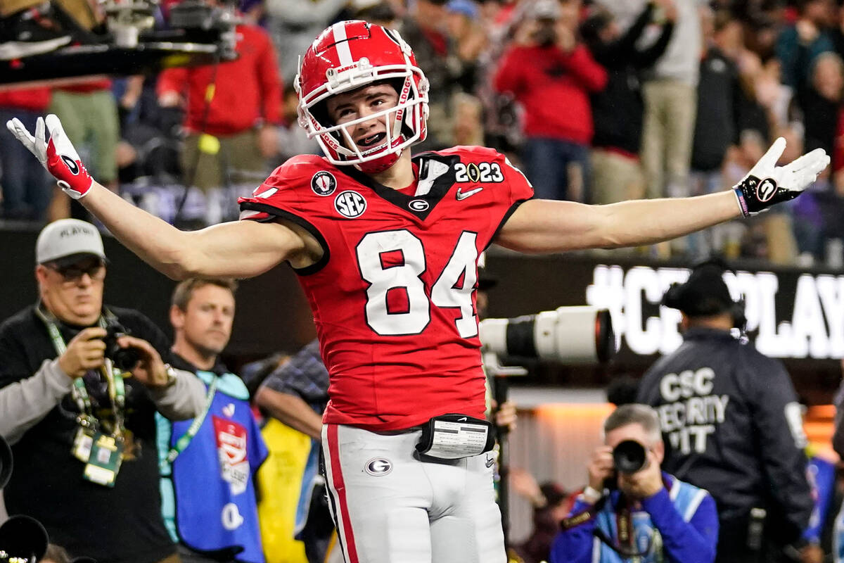 Georgia wide receiver Ladd McConkey (84) celebrates his touchdown against TCU during the second ...