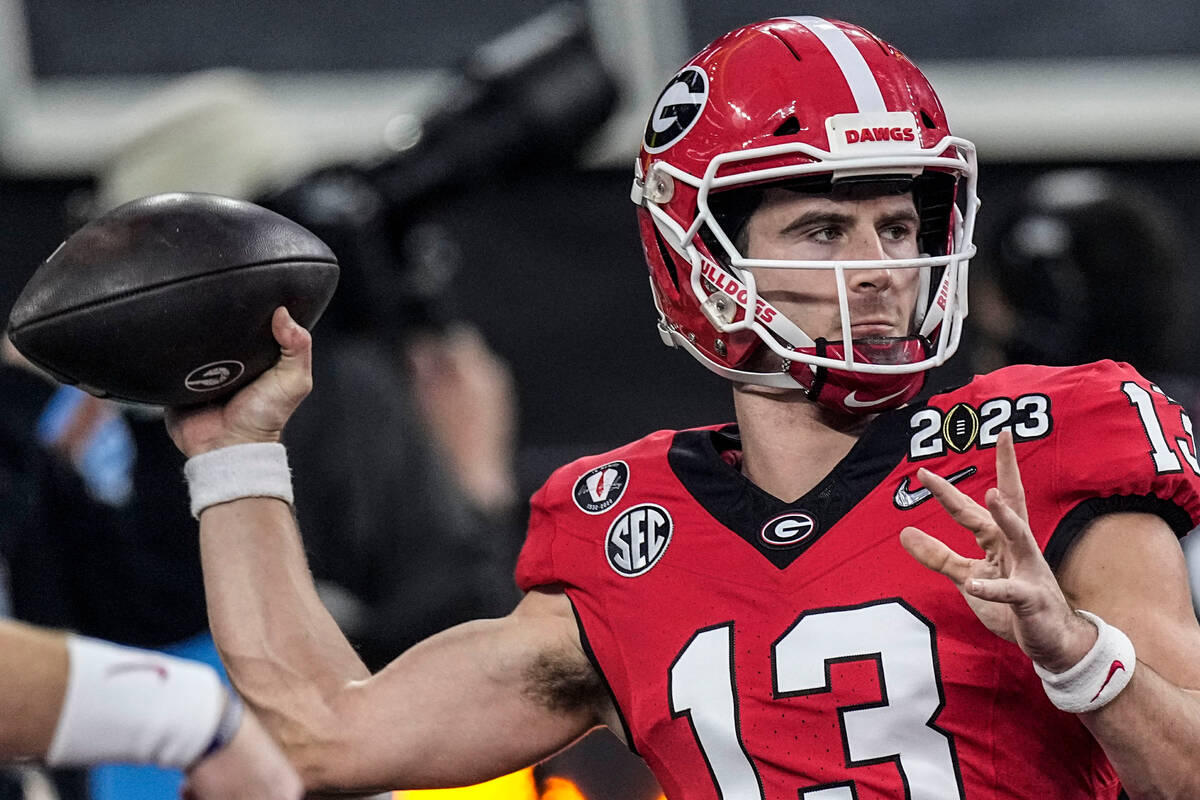 Georgia quarterback Stetson Bennett (13) warms up before the national championship NCAA College ...