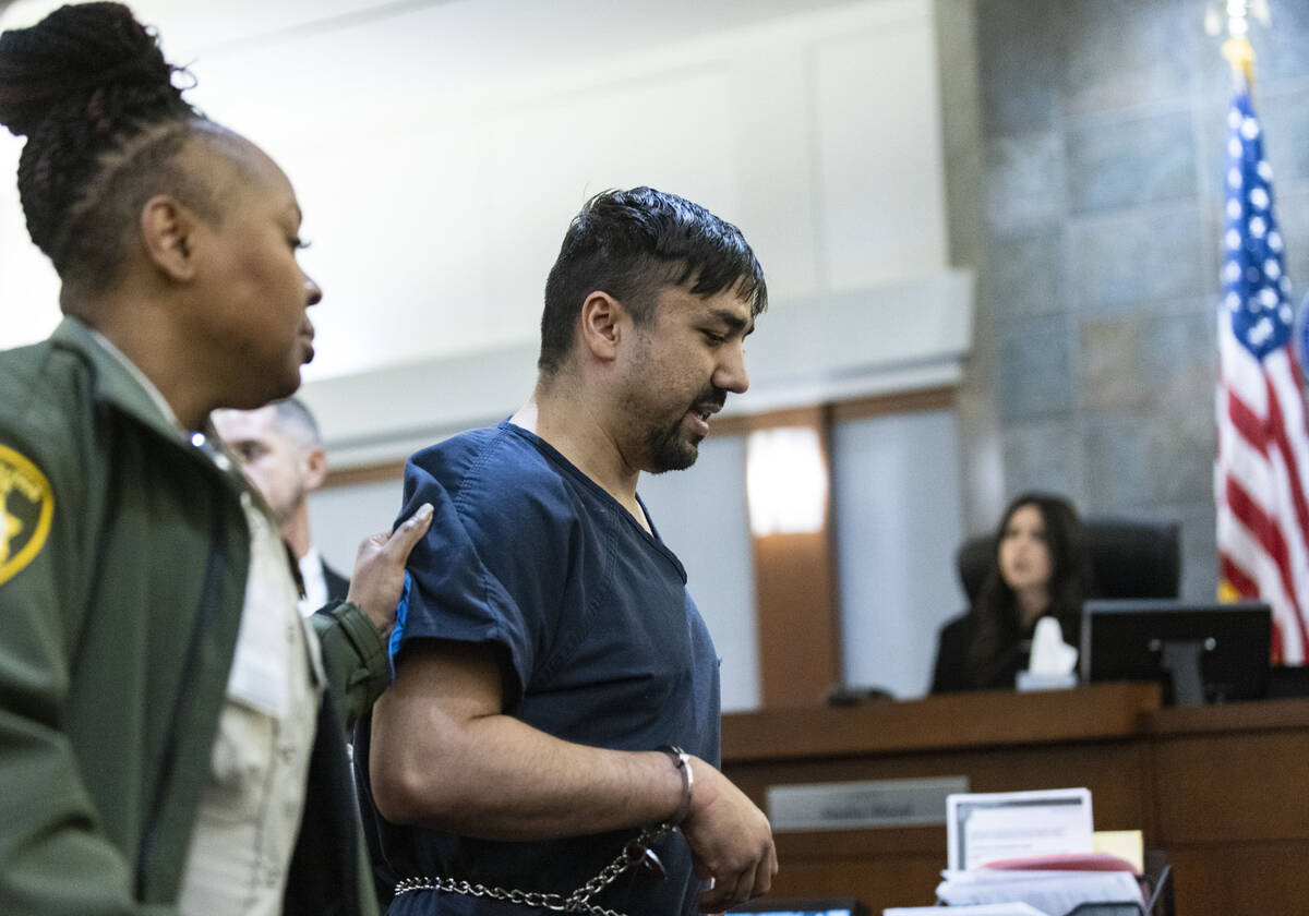 Mohammed Mesmarian, who is facing terror charges, led out of the courtroom after he interrupted ...