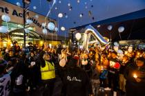 Balloons are released into the sky by family and friends during a celebration of life in memory ...