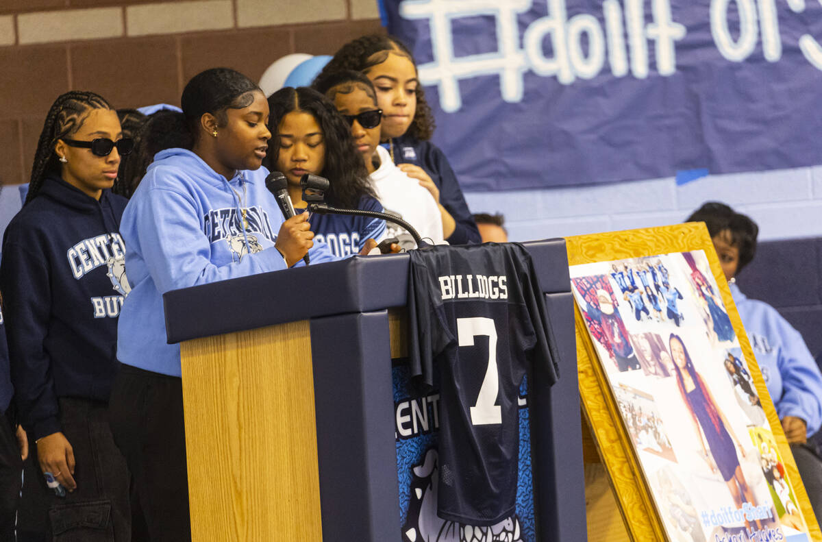 Friend and former teammate Ajah Barnes speaks during a celebration of life in memory of Ashari ...