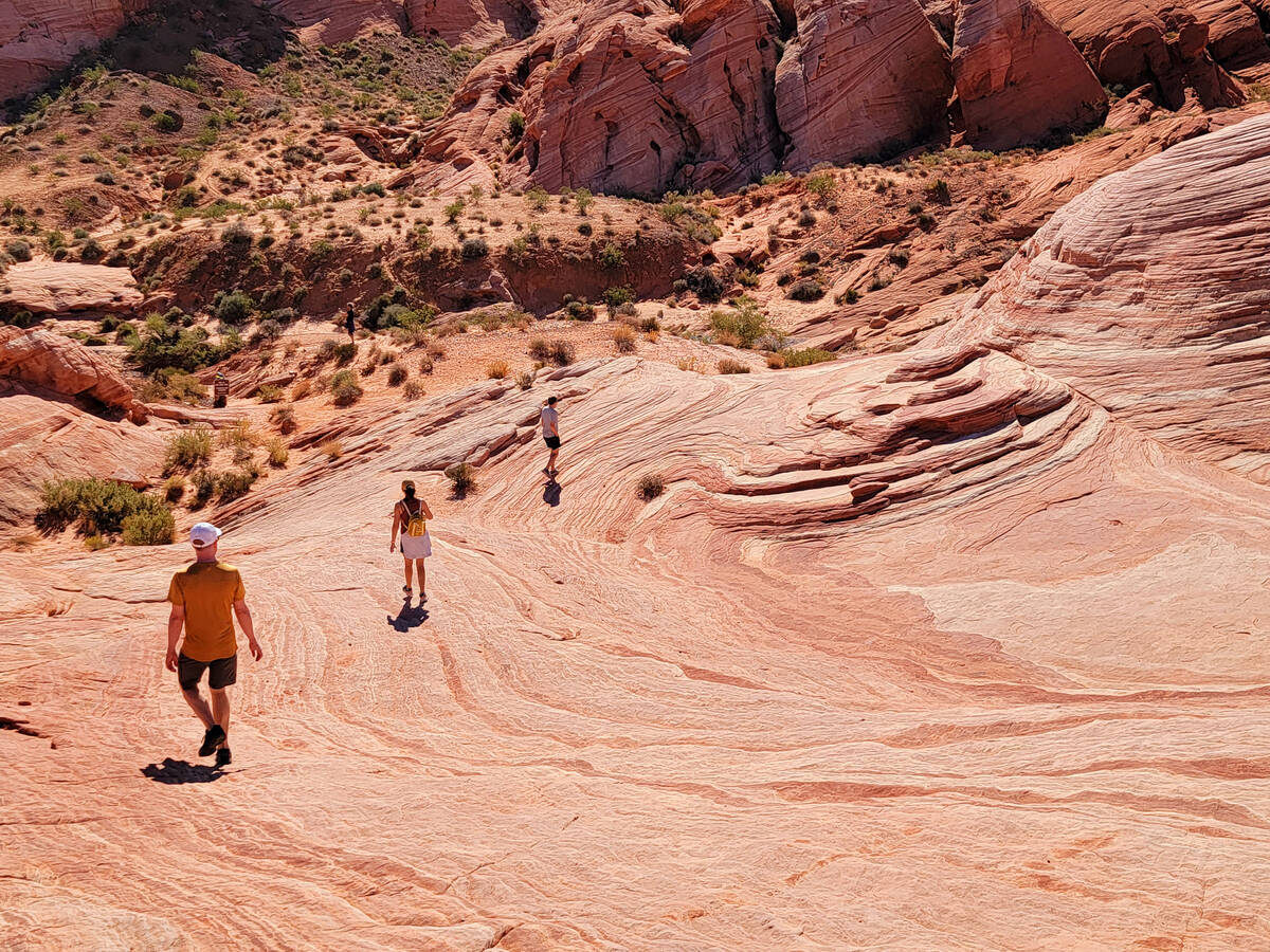 Visiting Northern Nevadans roam through the colorful rockscape at Valley of Fire State Park’s ...