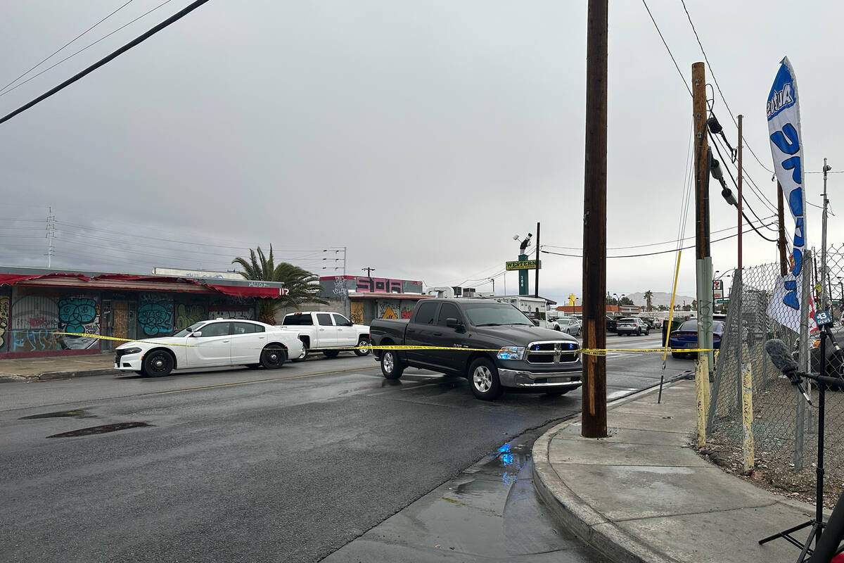 Police investigate a fatal shooting Tuesday, Jan. 10, 2023, at a tow business on the 100 block ...