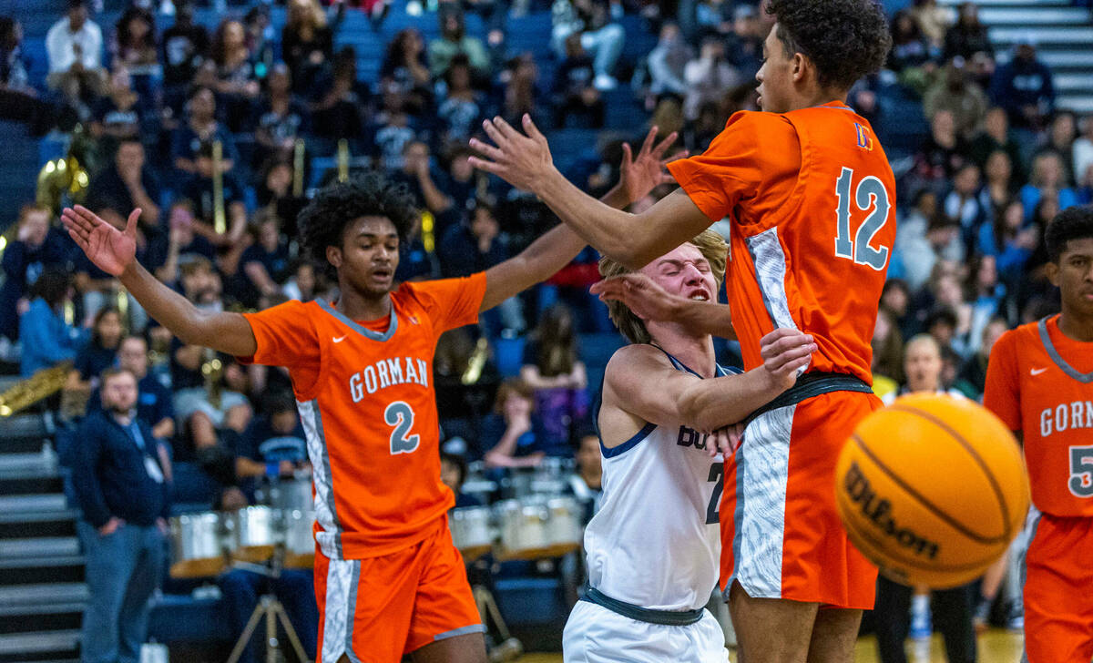 Centennial guard Gavin Ahlstrom (2) catches a backhand from Bishop Gorman forward Quentin Rhyme ...