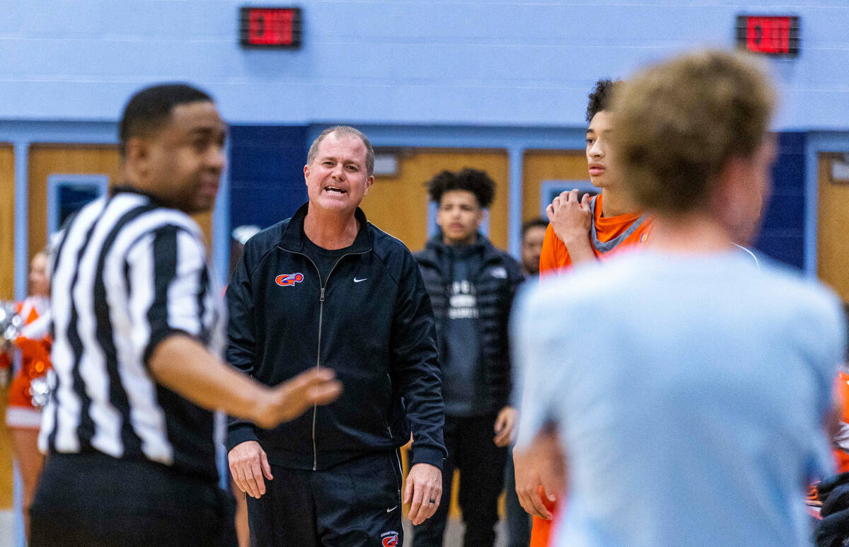 Bishop Gorman head coach Grant Rice argues a call against Centennial during the first half of t ...