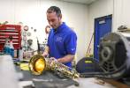 Meet the 2 CCSD employees who fix school-owned musical instruments