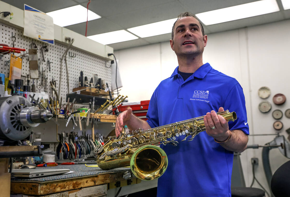 Tim Adelson, a musical instrument repair technician for the Clark County School District, speak ...