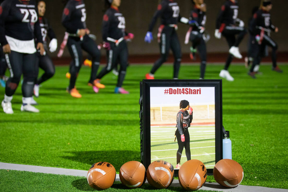 A photo of Ashari Hughes on the field at Desert Oasis High School as the varsity girls flag foo ...