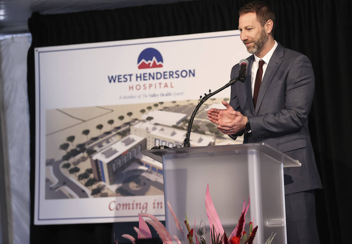 Chris Loftus, CEO of West Henderson and Desert Springs Hospitals, speaks before breaking ground ...