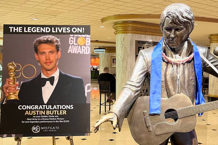 A congratulatory sign next to the famous bronze statue of Elvis Presley is shown at Westgate La ...