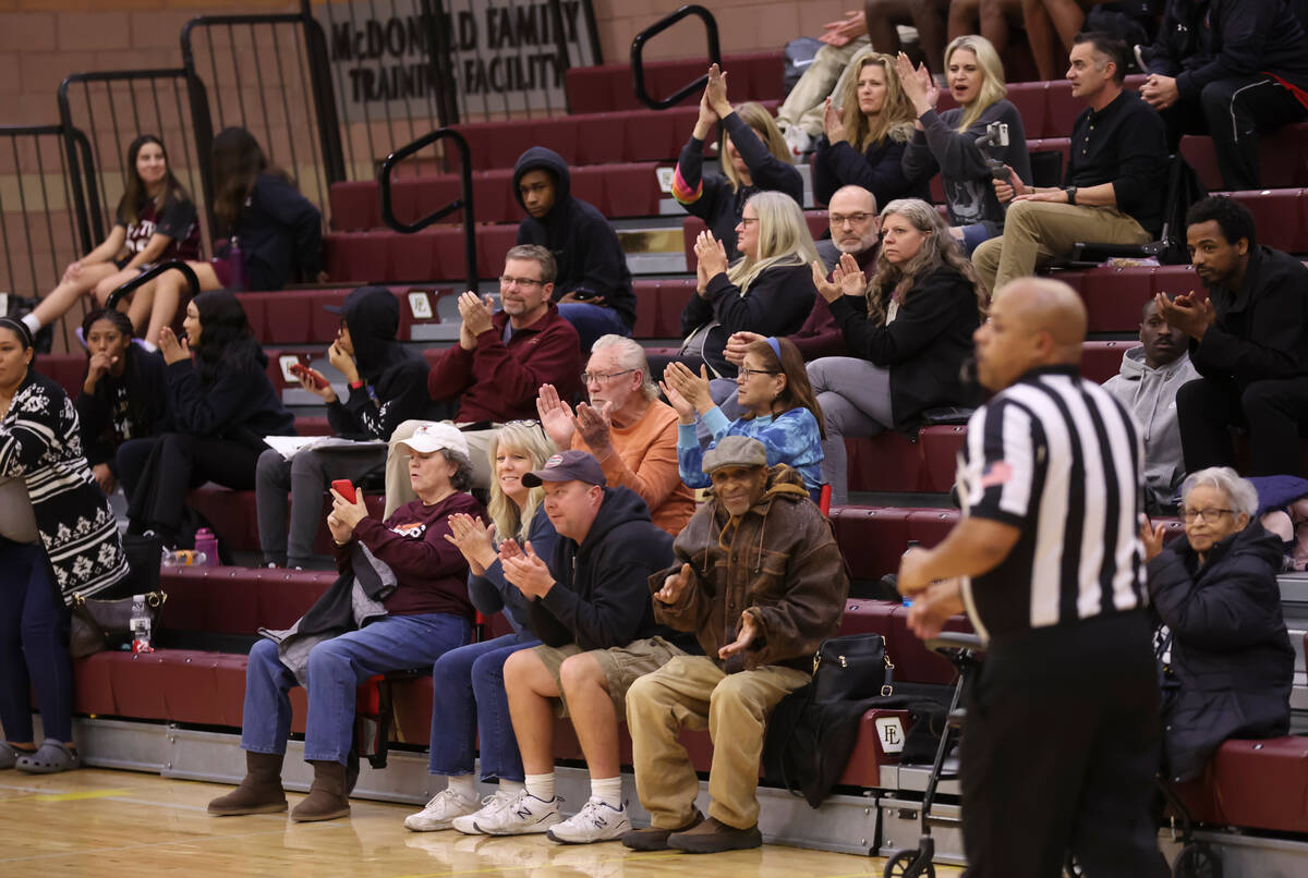 Faith Lutheran fans cheer during the second half of a basketball game against Spring Valley at ...