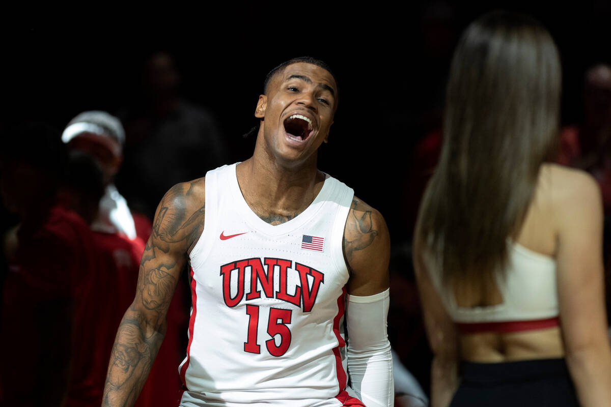 UNLV Rebels guard Luis Rodriguez (15) shouts to the crowd as he is announced in the starting li ...