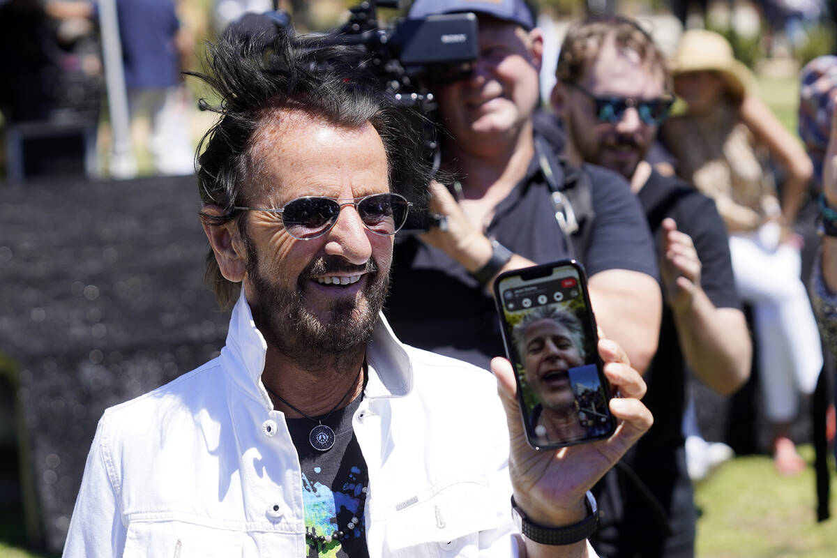 Ringo Starr gets a congratulatory phone call from his son Jason during his annual Peace & L ...