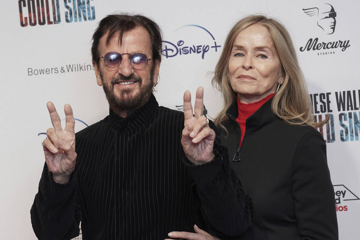 Ringo Starr, left, and Barbara Bach pose for photographers upon arrival for the premiere of the ...