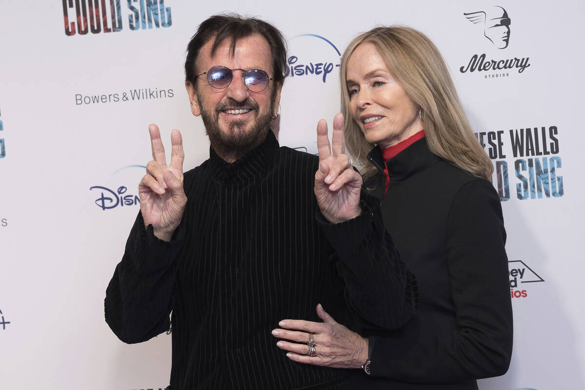 Ringo Starr, left, and Barbara Bach pose for photographers upon arrival for the premiere of the ...
