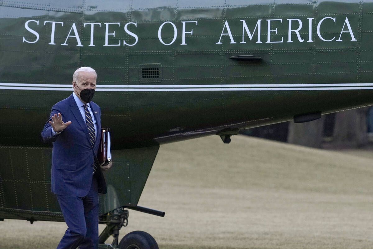 President Joe Biden walks from Marine One towards the Oval Office on the South Lawn of the Whit ...